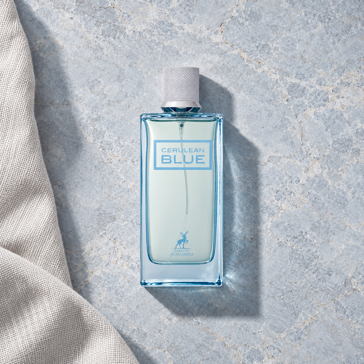 Maison Alhambra Cerulean Blue EDP 100 ml – parfém v prostředí, pohled shora s bočním stínem