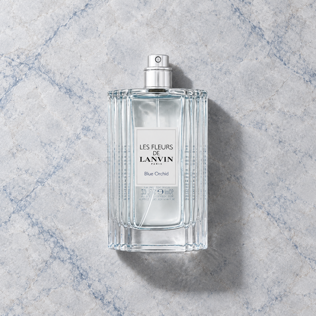 Lanvin Les Fleurs De Lanvin Blue Orchid 90 ml – parfém v prostředí, pohled shora s bočním stínem