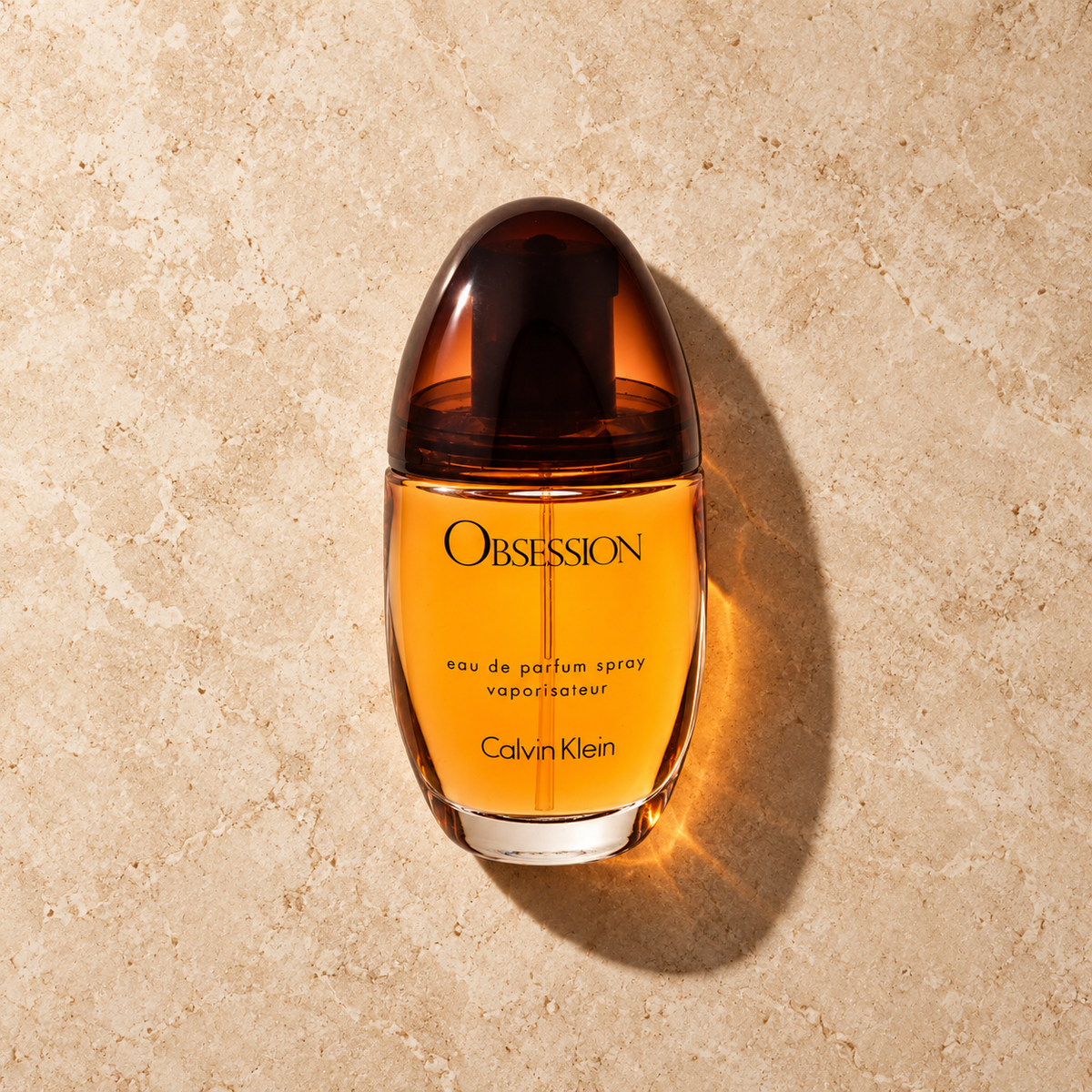 Calvin Klein Obsession for Women EDP 50 ml – parfém v prostředí, pohled shora s bočním stínem